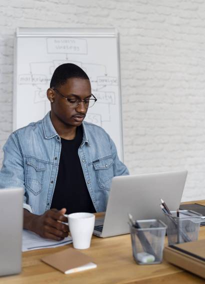 medium-shot-business-man-working-laptop